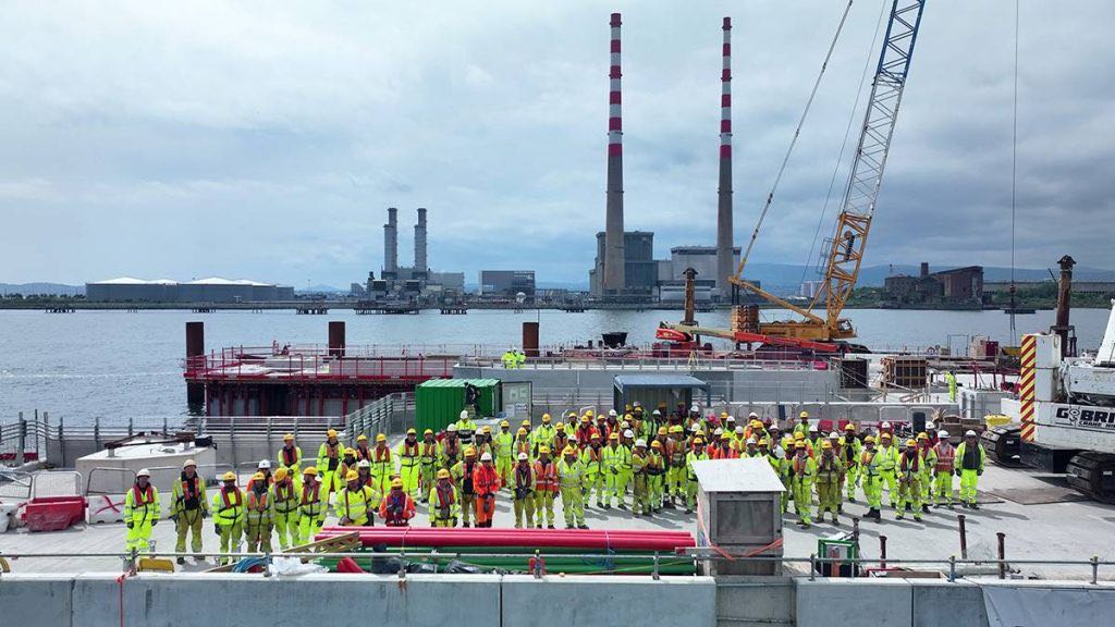 Project workforce assembled on the completed berth deck