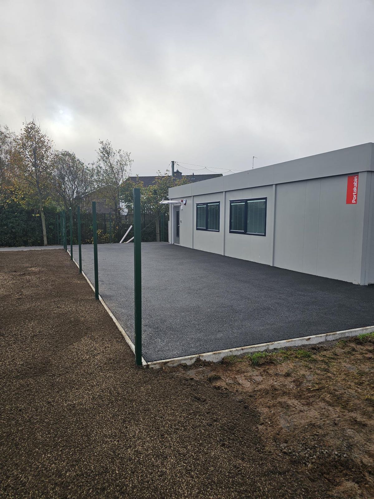 Finished modular classroom and hardstanding at a school campus