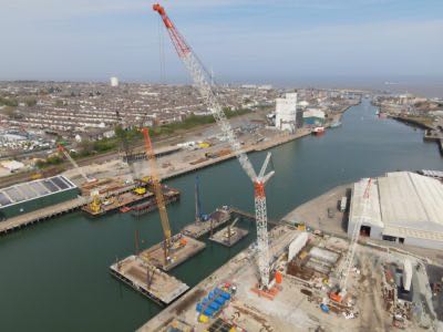 Heavy-lift cranes and piling pontoons during construction